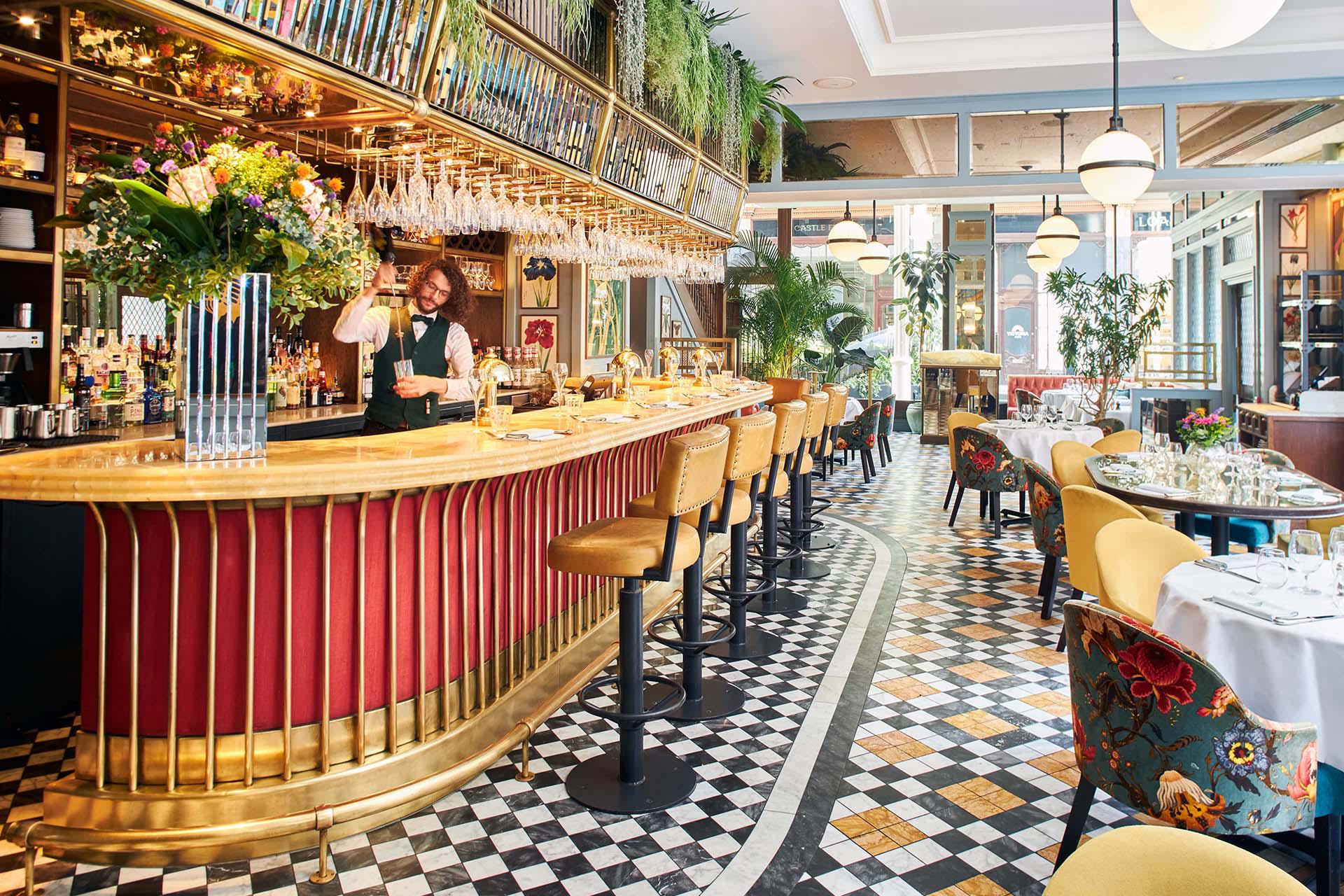 A photo of the inside bar and seating of The Ivy Victoria Quarter Leeds.