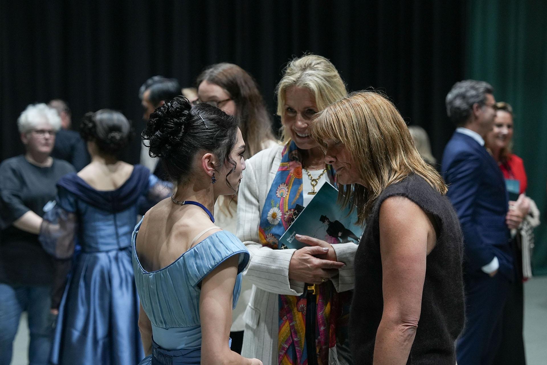 Northern Ballet dancer on stage meeting benefactors